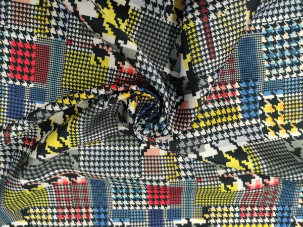 Tessuto Mikado a fantasia motivo piede de poule giallo - nero