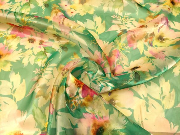 Tessuto Organza a fantasia motivo floreale acquamarina - rosa