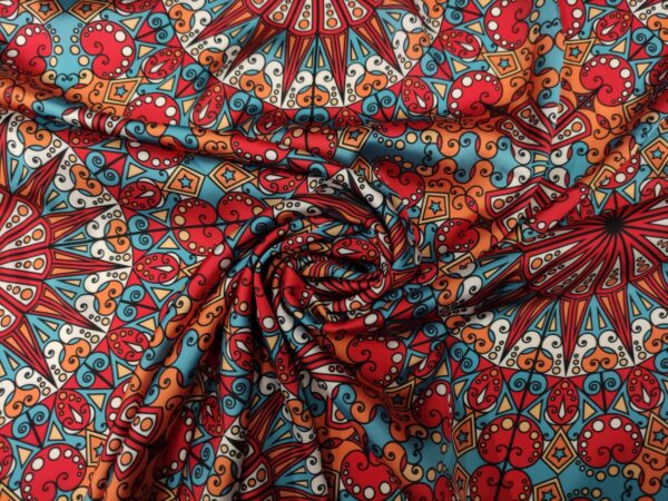 Tessuto Satin a fantasia motivo astratto arancione - turchese