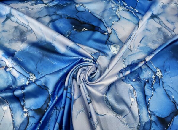 Tessuto Satin a fantasia motivo astratto blu elettrico - celeste