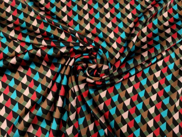 Tessuto Satin a fantasia motivo geometrico nero - turchese - rosa