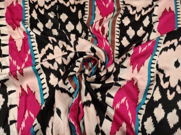 Tessuto Viscosa a fantasia motivo etnico fucsia - nero