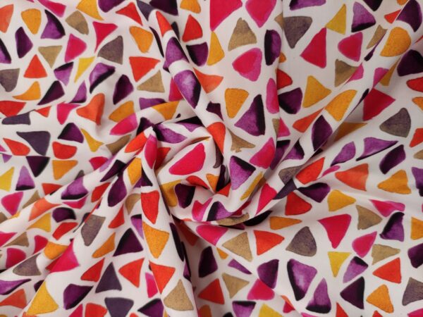 Tessuto Viscosa a fantasia motivo geometrico viola - arancione
