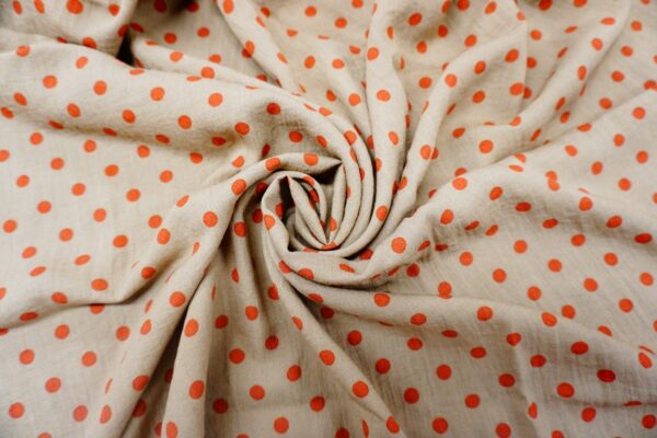 Tessuto Viscosa a fantasia motivo pois beige - arancione