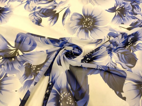Tessuto Chiffon a fantasia motivo floreale indaco - bianco