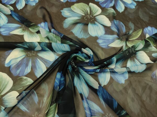Tessuto Chiffon a fantasia motivo floreale nero - verde ottanio