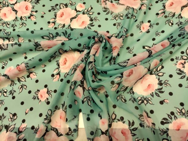 Tessuto Chiffon a fantasia motivo pois acquamarina - rosa