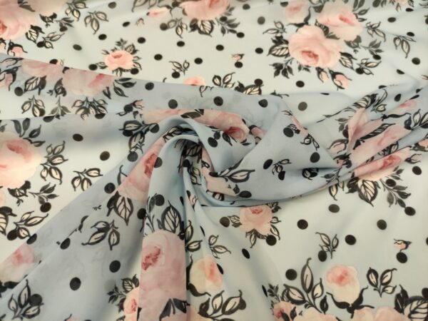 Tessuto Chiffon a fantasia motivo pois celeste - rosa