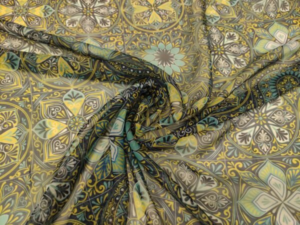 Tessuto Chiffon a fantasia motivo etnico blu - giallo