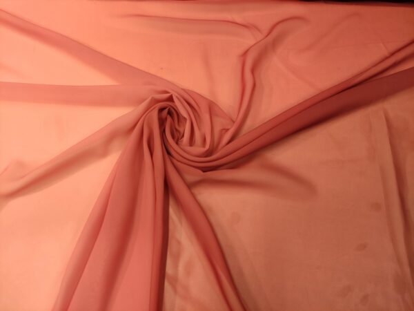 Tessuto Chiffon a fantasia motivo sfumato rosa - arancione
