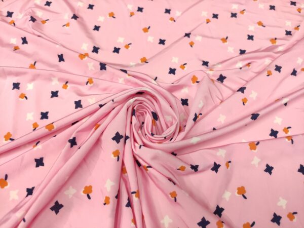 Tessuto jersey di viscosa a fantasia motivo geometrico rosa