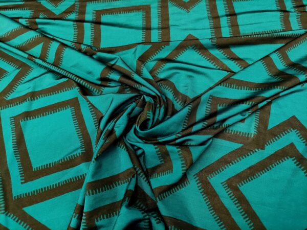 Tessuto jersey di viscosa a fantasia motivo geometrico verde ottanio - tortora