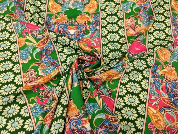 Tessuto Misto Viscosa a fantasia motivo astratto verde prato - fucsia