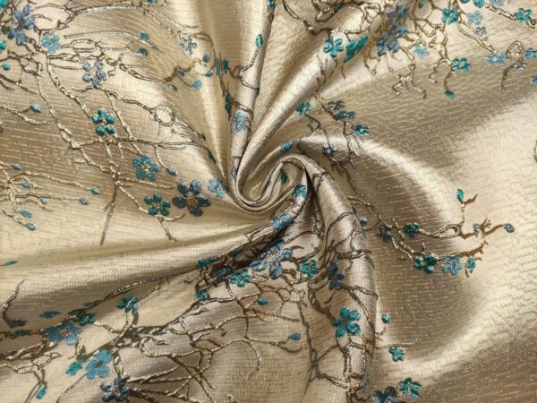 Tessuto Broccato in seta motivo floreale oro - turchese