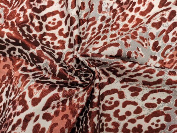 Tessuto Broccato in seta motivo animalier arancione - beige