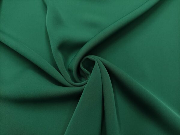 Tessuto Cady Mirage in tinta unita verde petrolio