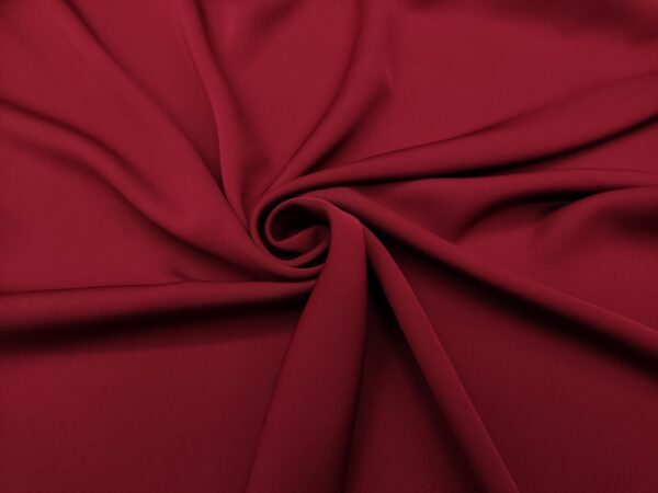 Tessuto Crepe Elite in tinta unita rosso scuro