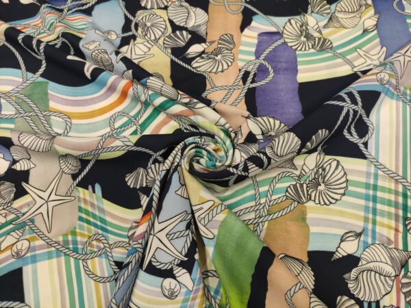 Tessuto Crepe a fantasia motivo astratto blu - beige - verde