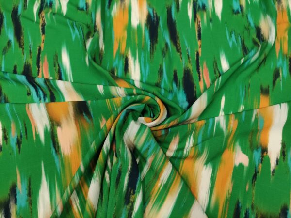 Tessuto Crepe a fantasia motivo astratto verde - mela - giallo