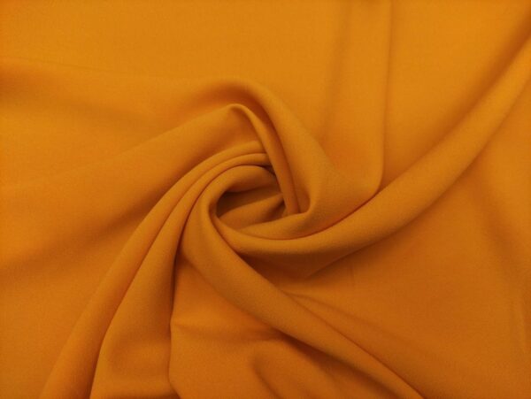Tessuto Crepe Cady tinta unita ocra