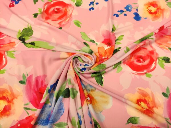 Tessuto Crepe a fantasia motivo floreale rosa - azzurro