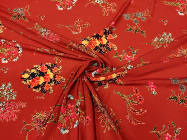 Tessuto Crepe a fantasia motivo floreale rosso - giallo