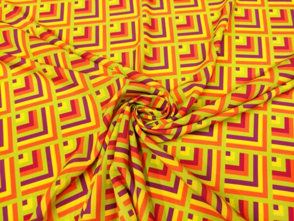 Tessuto Crepe a fantasia motivo geometrico arancione - giallo - viola