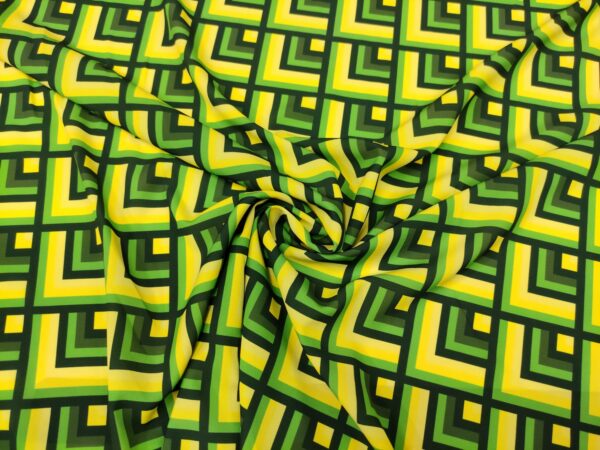 Tessuto Crepe a fantasia motivo geometrico giallo - lime - verde