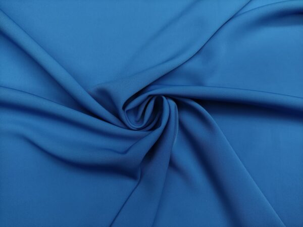 Tessuto Crepe morbido in tinta unita azzurro
