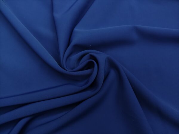 Tessuto Crepe morbido in tinta unita blu medio