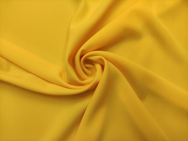 Tessuto Crepe morbido in tinta unita giallo