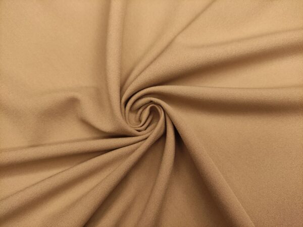 Tessuto Crepe morbido in tinta unita nocciola