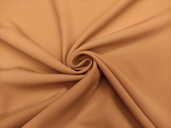 Tessuto Crepe morbido in tinta unita rosa nude