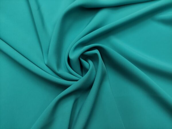Tessuto Crepe morbido in tinta unita turchese