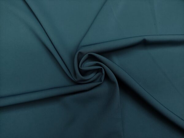 Tessuto Crepe morbido in tinta unita verde ottanio