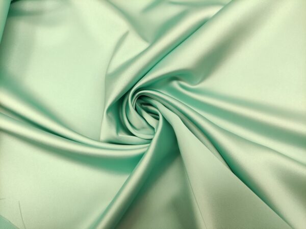 Tessuto Duchesse elasticizzato in tinta unita acquamarina