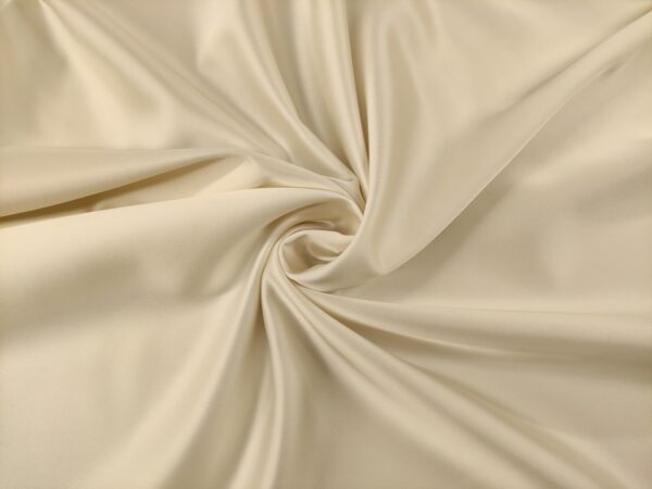 Tessuto Duchesse elasticizzato in tinta unita avorio