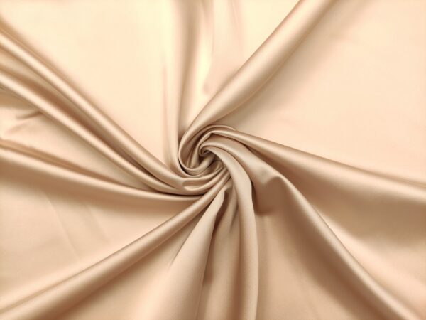 Tessuto Duchesse elasticizzato in tinta unita beige