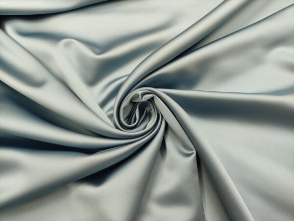 Tessuto Duchesse elasticizzato in tinta unita celeste