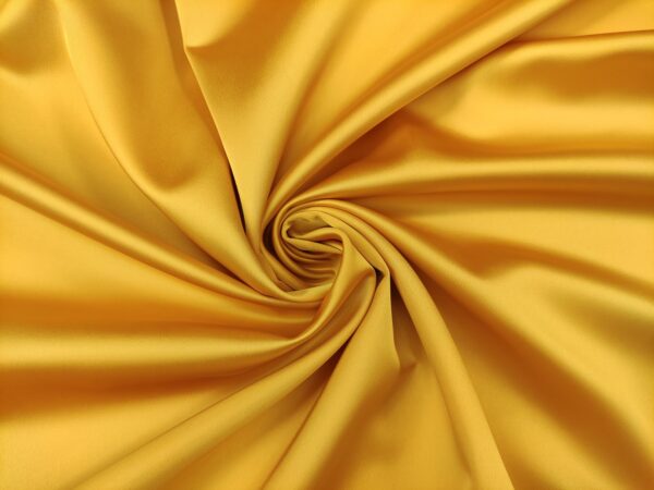 Tessuto Duchesse elasticizzato in tinta unita giallo