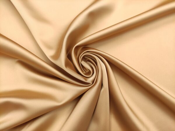 Tessuto Duchesse elasticizzato in tinta unita oro