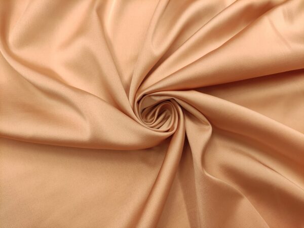 Tessuto Duchesse elasticizzato in tinta unita rosa nude