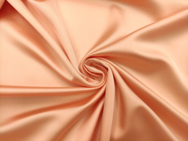 Tessuto Duchesse elasticizzato in tinta unita rosa salmone