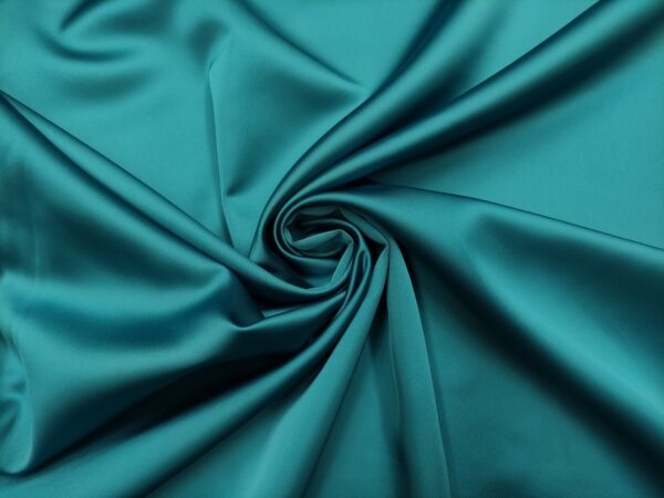 Tessuto Duchesse elasticizzato in tinta unita verde ottanio