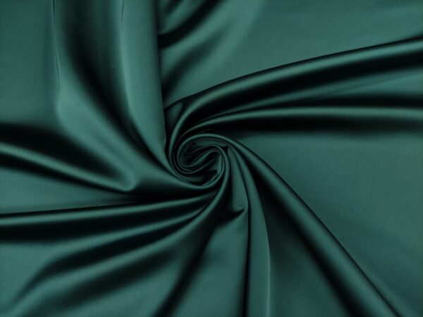 Tessuto Duchesse elasticizzato in tinta unita verde petrolio