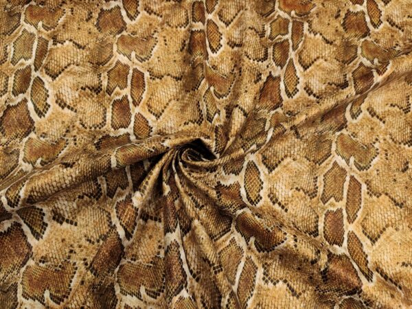 Tessuto Ecopelle per abbigliamento motivo animalier beige