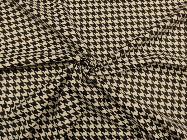 Tessuto Ecopelle per abbigliamento motivo piede de poule bianco - nero