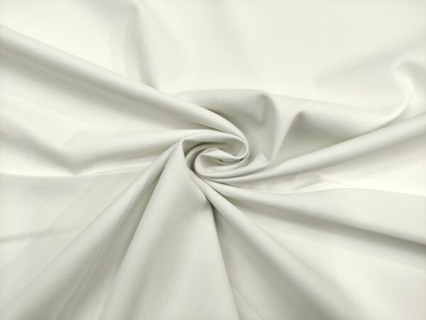 Tessuto Ecopelle per abbigliamento tinta unita bianco