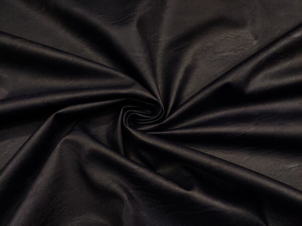 Tessuto Ecopelle per abbigliamento tinta unita blu notte
