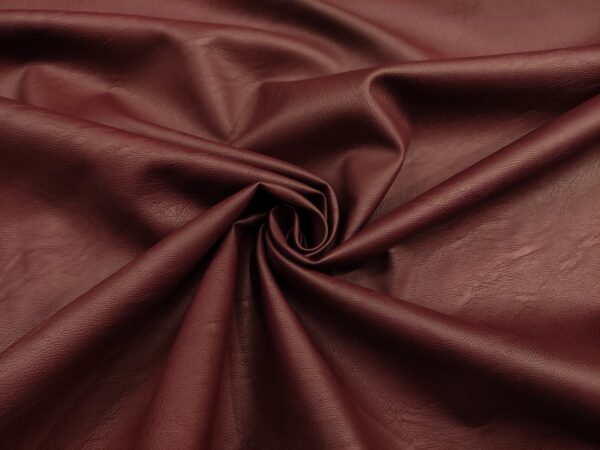 Tessuto Ecopelle per abbigliamento tinta unita bordeaux